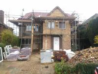 two storey extension with loft conversion and single sorey rear extension by DKM Consultants